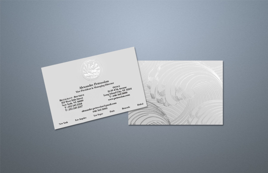 Petrossian
Executive Business Cards
1000 business cards, 2 1/8” x 3 3/16”  Printing  both sides on 130 # Cougar Bright White Opaque Cover.
Side one prints black ink and bright (flat) silver foil stamp.  Side two is silver foil stamp w/bleed on all sides.  Box pack.